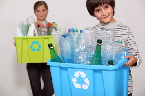 Professional waste management team handling office waste